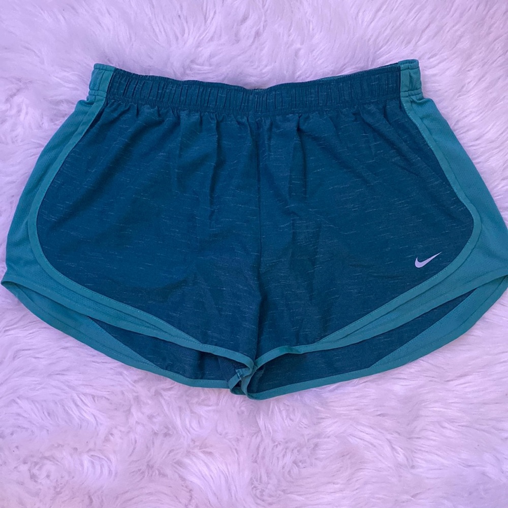 green nike shorts
